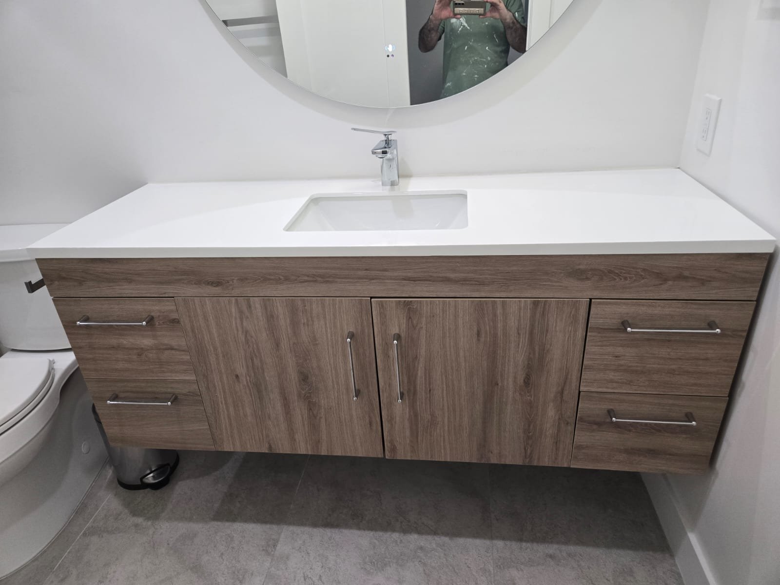 Custom floating wood vanity and luxury bathroom remodel in La Canada Flintridge CA by Ararat Builders Corp