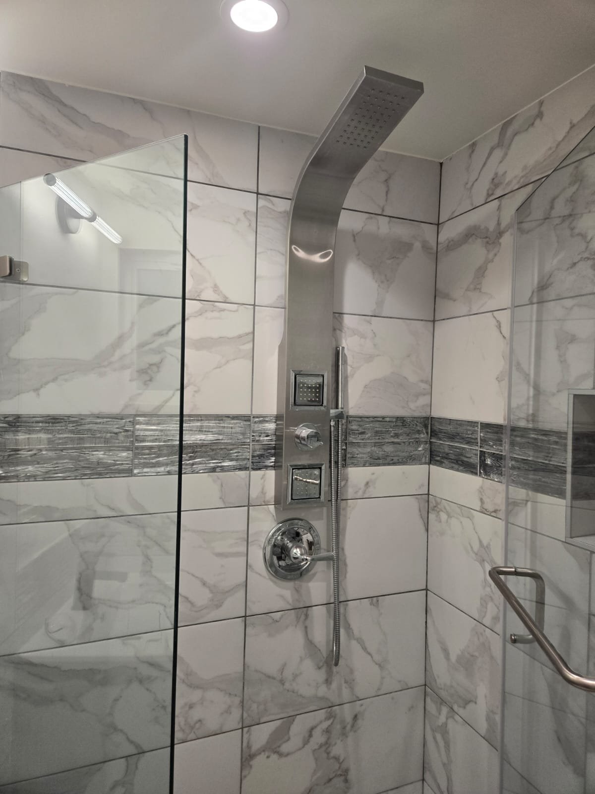 Luxury Calacatta marble shower tower and primary bath in Beverly Hills CA by Ararat Builders Corp